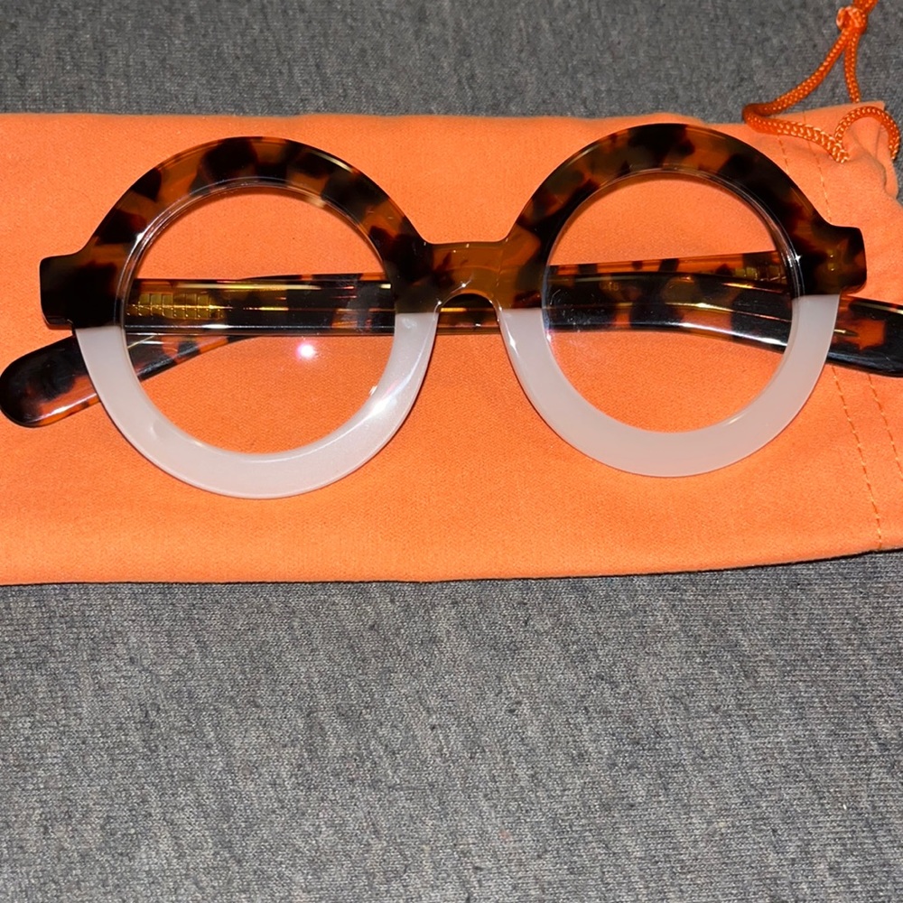 Brown and White Glasses